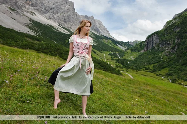 Hot mountain maiden Belinda loses long dress to enjoy a breeze on her big tits  - Outdoor, European, MILF, Blonde, Big Tits, Model, Spreading, Glamour, Skirt, Beautiful  - Photo 1