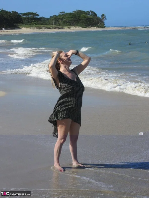 Older UK amateur Lily May sets her large boobs loose while walking on a beach  - SSBBW, BBW, Mature, Skirt, Non Nude, Amateur, Chubby, Beach, Curvy, Blonde  - Photo 19