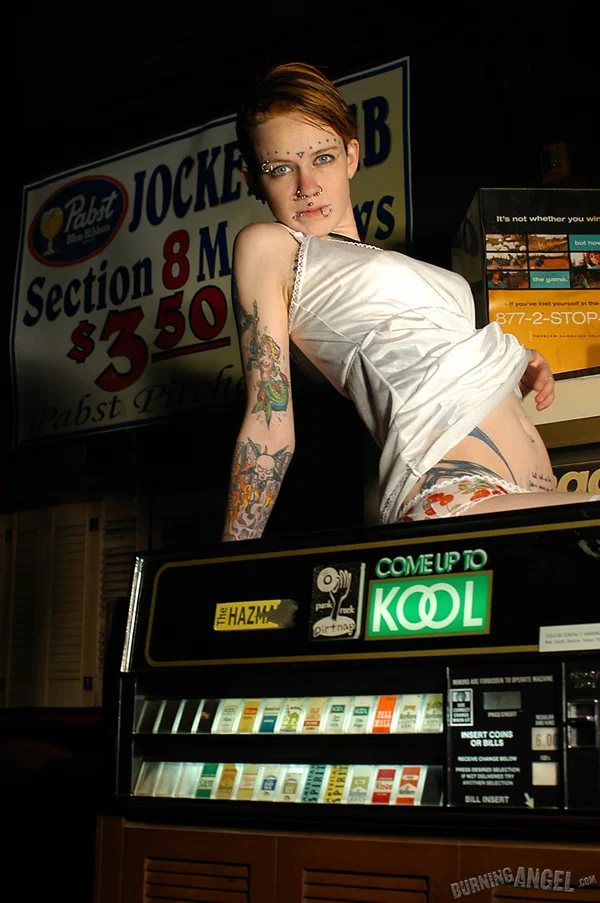 Babe with short hair and heavy tattoos is a striptease at an empty bar  - Piercing, Fetish, Tattoo, Tiny Tits, Nipples, Short Hair, Spreading, Non Nude  - Photo 3