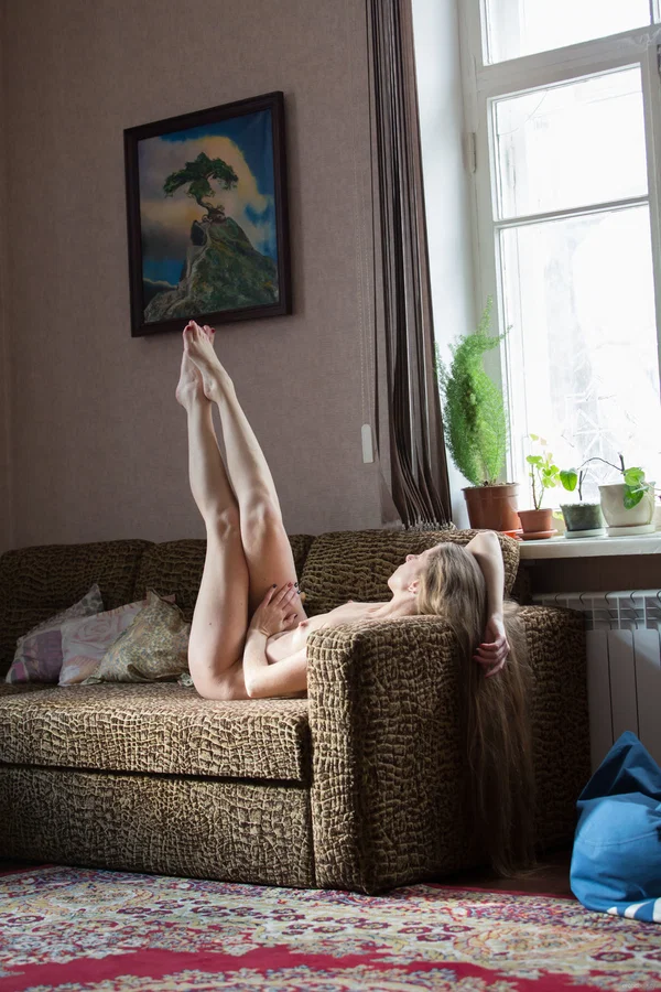 Teen girl with long hair Mika A gets totally naked on a sofa in a window sill  - Teen, Amateur, Cute, Pussy, Blonde, Tiny Tits, Beautiful, Sexy, Panties, Model  - Photo 13