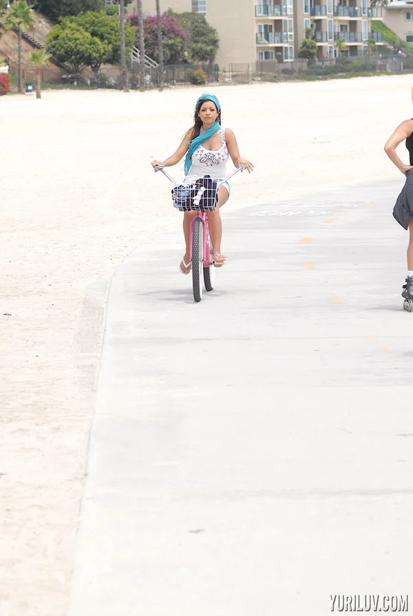 Dark-haired pornstar Yuri Luv goes for a bike ride in her lovely outfit  - Beach, Shorts, MILF, Beautiful, Babe, Pornstar, Outdoor, Reality, Sexy, Solo  - Photo 2