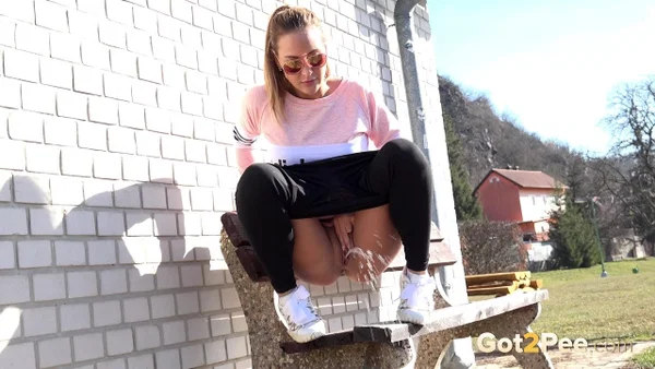 Solo girl Naomi Bennet pisses on a public bench in the middle of the day  - Pissing, Public, Czech, Pussy, Glasses, Outdoor, Blonde, Spreading, Close Up, Babe  - Photo 5
