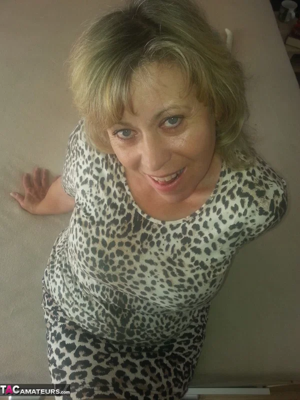 Mature wife Caro frees her fatty big tits & sucks her vibrator before toying  - Mature, BBW, Amateur, Clothed, Big Tits, Skirt, European, Blonde, Chubby, Curvy  - Photo 2