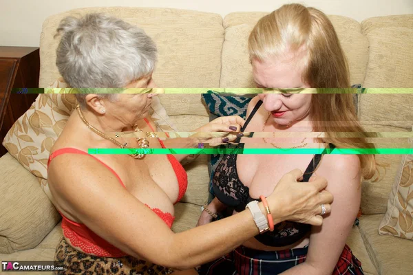 Older British woman has lesbian sex with a younger blonde on a sofa  - Mature, Chubby, Thick, Curvy, Redhead, Amateur, BBW, Stockings, Skirt, Undressing  - Photo 7