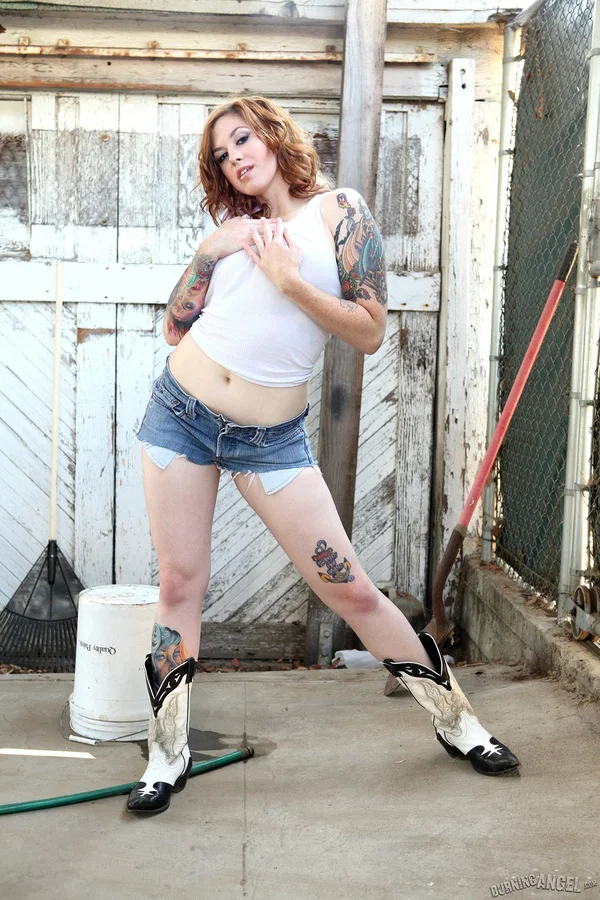 Tatted cowgirl Swindle shows off her luscious ass and big, wet tits out back  - Fetish, Big Tits, Outdoor, Non Nude, Spreading, Pussy  - Photo 1