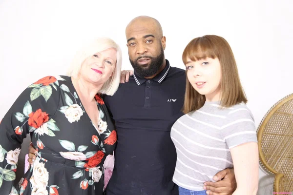 Brunette teen Cherry English and old hottie Lacey Starr suck a black cock  - Groupsex, Interracial, Stockings, British, Clothed, Skirt, Handjob, Big Tits, Blowjob, Non Nude  - Photo 6
