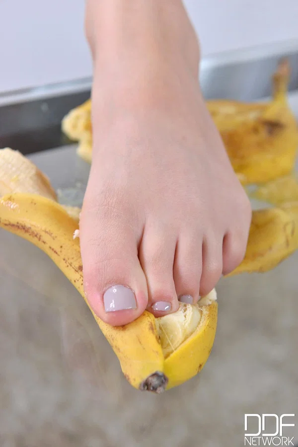 Pretty white girl Ariana Brown takes off her socks before crushing a banana  - Feet, Teen, Brunette, Glasses, Legs, Cute, British, Curly, White, Sexy  - Photo 13