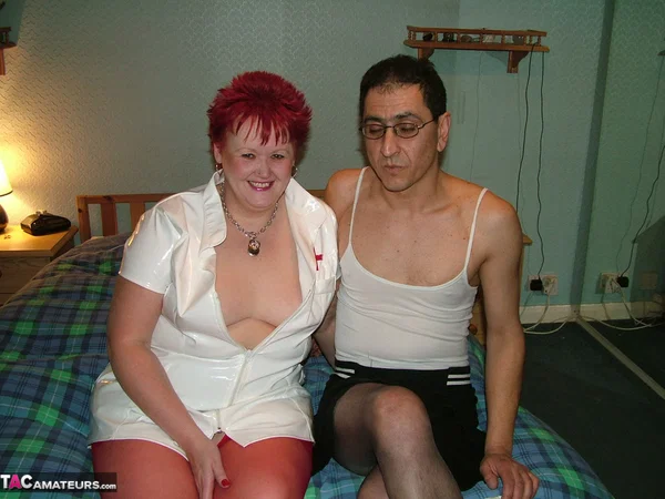 Mature nurse with red hair Valgasmic Exposed indulges in foreplay with a sissy  - Nurse, Mature, Chubby, Latex, BBW, Curvy, Amateur, Thick, Boots, Redhead  - Photo 4