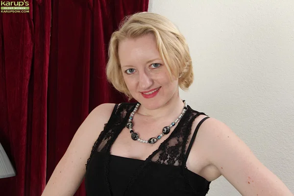 Blonde Anya Volcov plays with her big booty and old pussy on the sofa  - MILF, Spreading, Hairy, Stockings, Nipples, Pussy, Feet, Ass, Short Hair, Undressing  - Photo 1