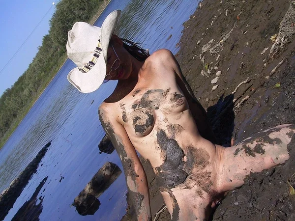 Skinny babe in a cowboy hat flaunts her tiny tits & spreads naked in the mud  - Beach, Wet, MILF, Outdoor, Fetish, Tiny Tits, Ass, Glasses, Asshole, Amateur  - Photo 3
