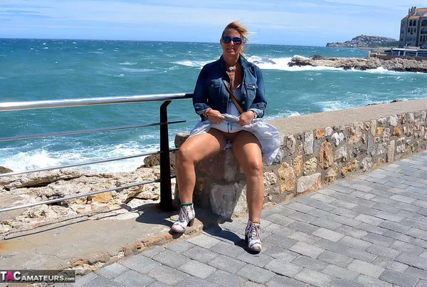 Mature fatty Chrissy walks by the sea with her round big tits bared  - Mature, Beach, BBW, Glasses, Amateur, Outdoor, Chubby, Blonde, MILF, European  - Photo 9