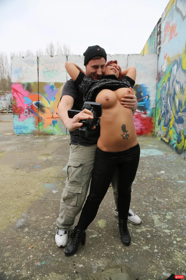 Kinky German MILF Jolyne Joy gets her big tits massaged by a photographer  - German, Mature, Short Hair, MILF, Redhead, Big Tits, Outdoor, High Heels, Clothed, Pornstar  - Photo 10