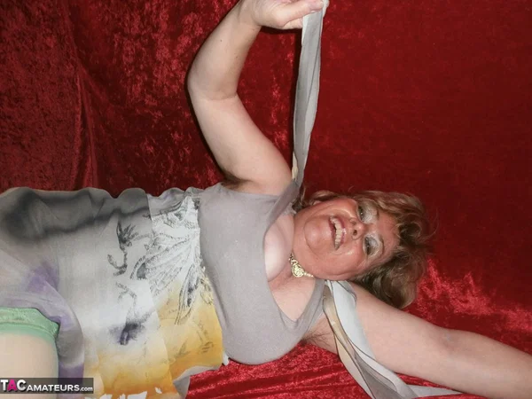 Chubby mature granny Caro in green stockings flashes lace panty cameltoe  - Granny, BBW, Amateur, Stockings, Panties, Big Tits, High Heels, Curvy, Chubby, Thick  - Photo 16