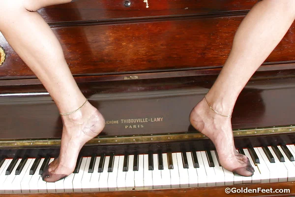 Aged mature woman Lady Sarah playing piano in see thru mesh outfit  - Mature, Stockings, Piercing, European, Close Up, Legs, High Heels, Spreading, Feet, Reality  - Photo 14