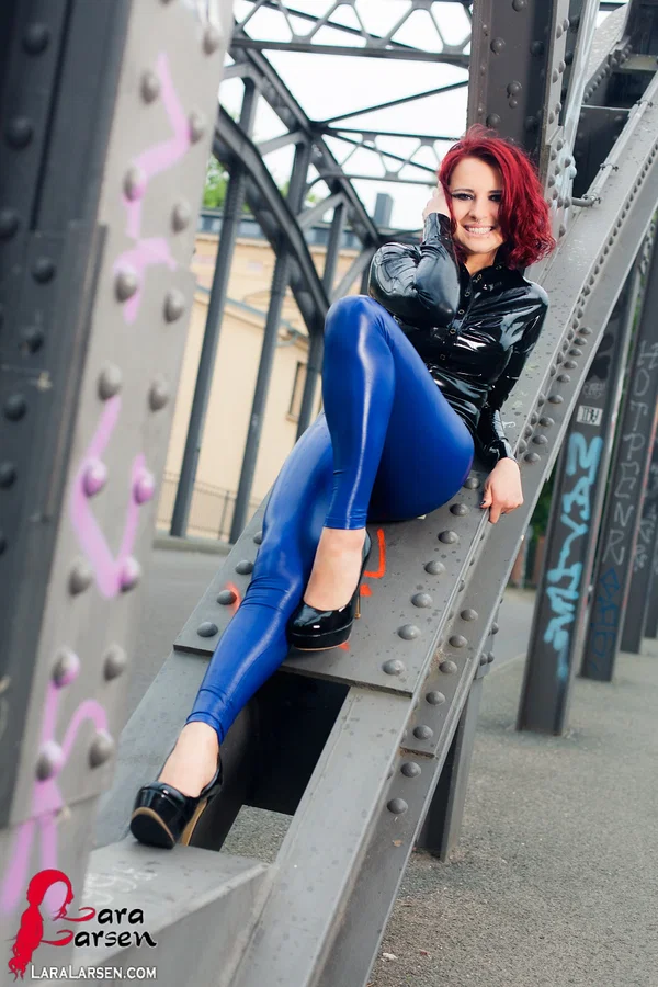 Sexy redhead Lara Larsen models non nude in latex and heels on steel girders  - Latex, Fetish, Non Nude, Redhead, Amateur, Clothed, High Heels, Outdoor, Babe, Ass  - Photo 6