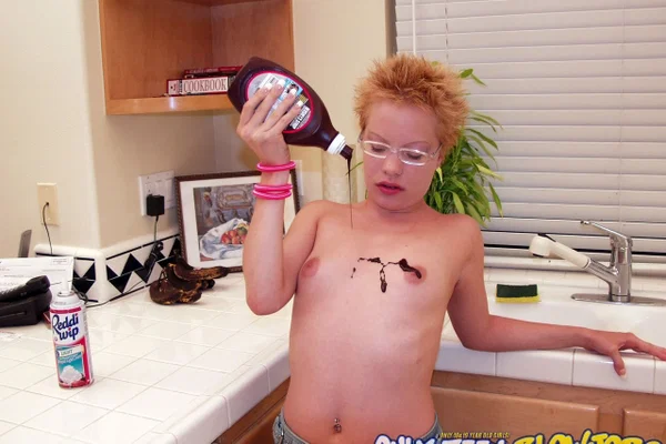 Naughty redhead Emily Davinci goes topless & indulges in a food play solo  - Short Hair, Glasses, Redhead, Beautiful, Skirt, Teen, Clothed, Kitchen, Tiny Tits, Ass  - Photo 16