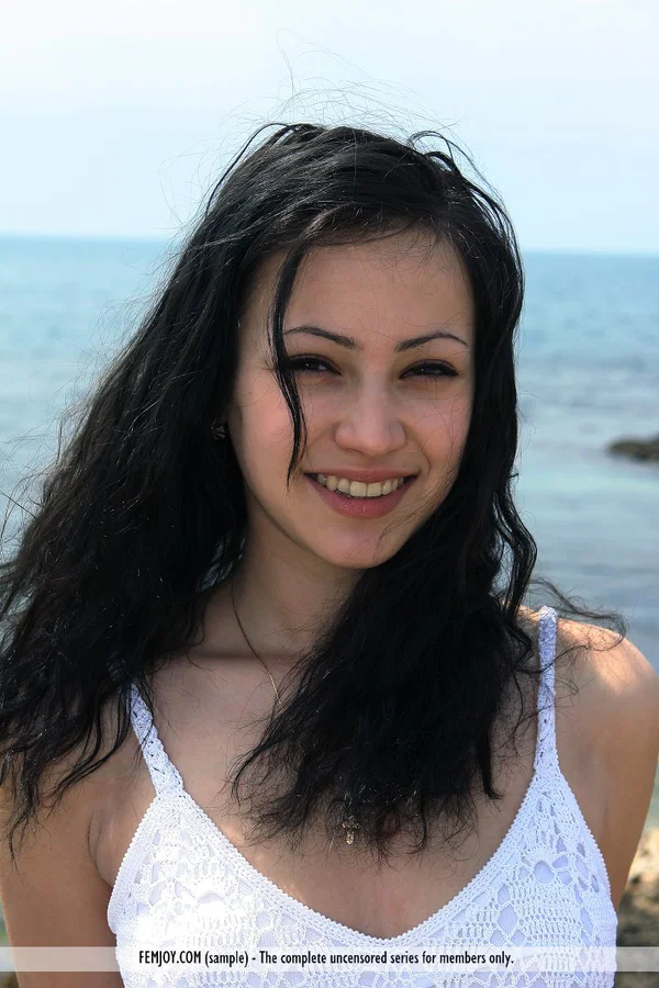 Dark haired girl confidently exhibits her naked body with the sea at her back  - Spreading, Outdoor, Hairy, Babe, Big Tits, Pussy, Beautiful, Glamour, Feet, Face  - Photo 4