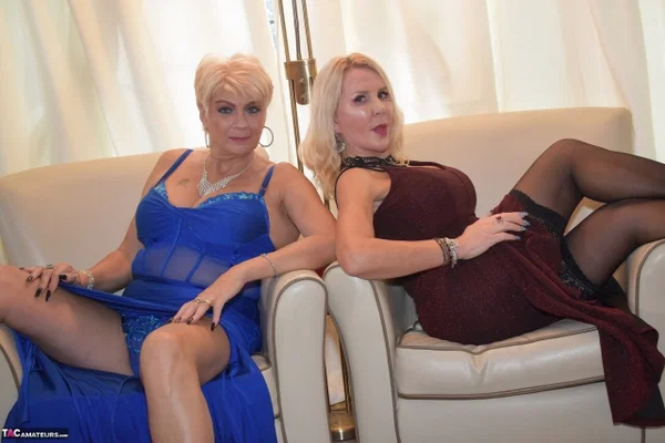 Older blonde lesbians disrobe to high-heeled shoes while sporting butt plugs  - Mature, Amateur, Big Tits, Stockings, Lingerie, Short Hair, Lesbian, High Heels, Panties, Anal  - Photo 6