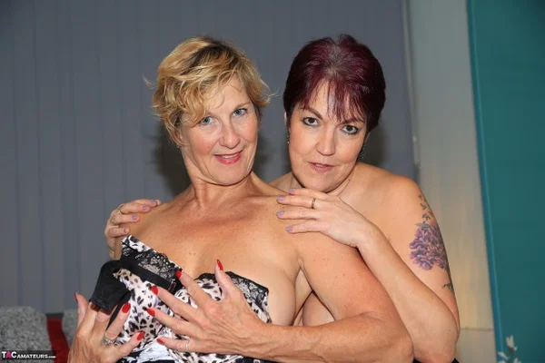 Older maid Molly MILF partakes in lesbian play with her employer on a bed  - Mature, Maid, Cosplay, Lingerie, Curvy, Chubby, Amateur, Pantyhose, Short Hair, Thick  - Photo 16