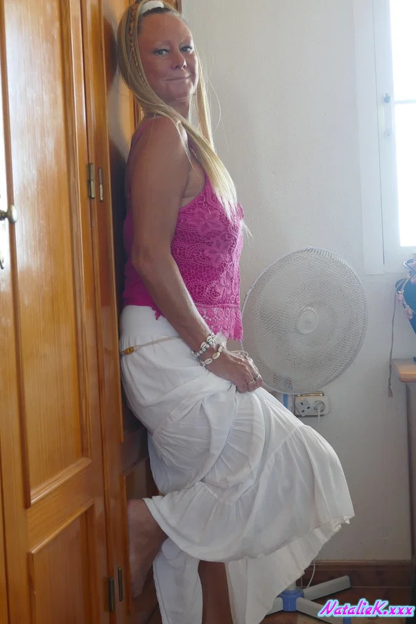 Mature blonde Natalie K takes off her panties & shows her pussy on her bed  - Upskirt, MILF, Spanish, Panties, Amateur, Sexy, Pornstar, Skirt, Feet, Legs  - Photo 15