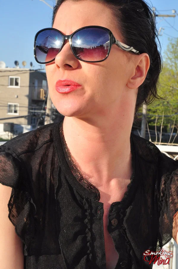 Fully clothed brunette woman smokes and drinks on patio in sunglasses  - Smoking, Non Nude, Fetish, Glasses, Brunette  - Photo 12