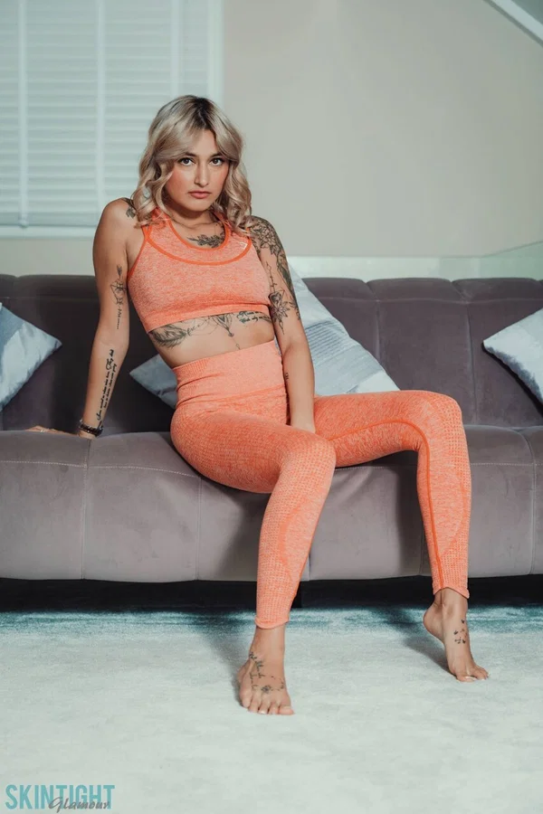 Tattooed blonde Seline P Seline P removes skintight athletic wear to get naked  - Yoga Pants, Tattoo, Model, Big Tits, Clothed, Undressing, Legs, Blonde, Glamour, Spreading  - Photo 2