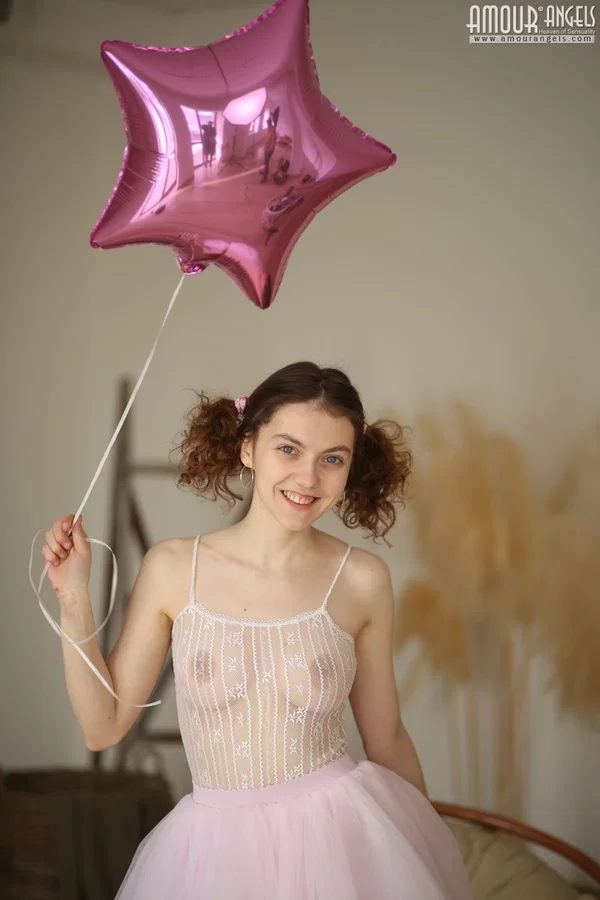 Sweet teen Suzy holds a balloon while getting completely naked  - Clothed, Ass, Skirt, Close Up, Lingerie, Panties, PAWG, Feet, Legs, Amateur  - Photo 3