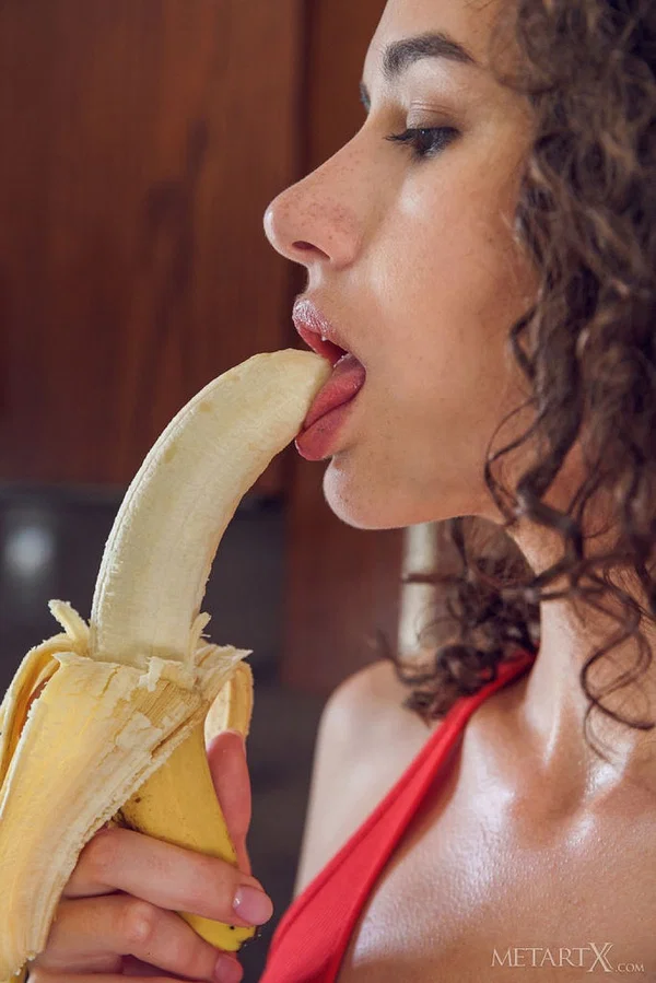 Young girl with wavy brunette hair Cristin gets naked after eating a banana  - Teen, Tiny Tits, Legs, Panties, Pussy, Close Up, Ass, Shaved, Spreading, PAWG  - Photo 5