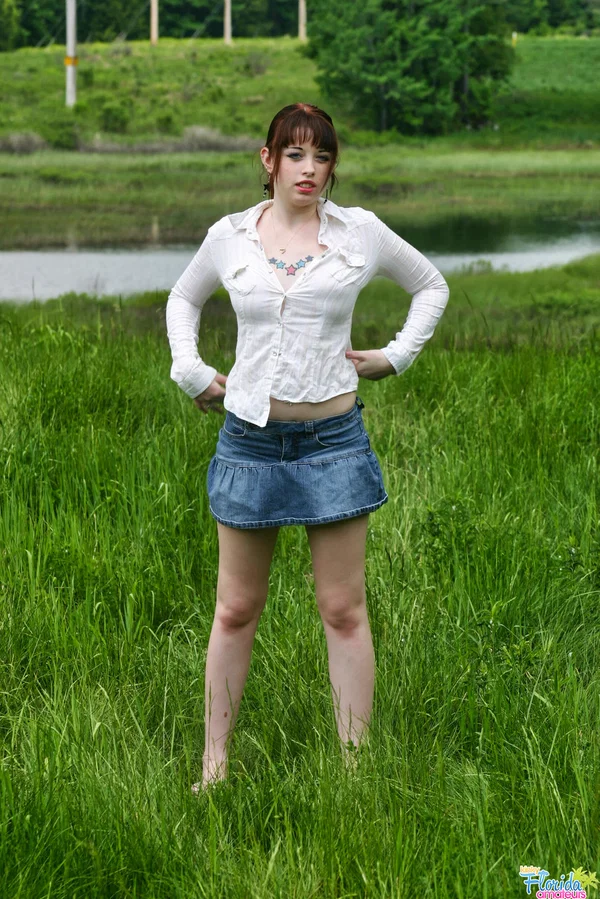 Amateur girl with red hair Barbie A exposes her tits while in a grassy field  - Amateur, Outdoor, Redhead, Clothed, Pigtails, Legs, Skirt, Big Tits, Upskirt, Tattoo  - Photo 2
