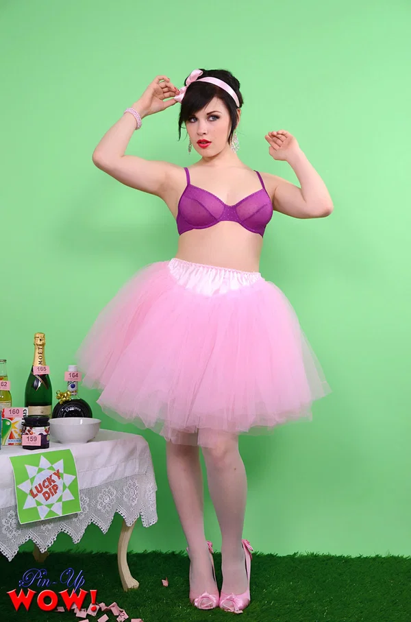 Pinup model Jocelyn-Kay lets her hair down before uncupping her nice breasts  - Lingerie, Skirt, Babe, Stockings, Panties, Legs, Clothed, Big Tits, British, High Heels  - Photo 1