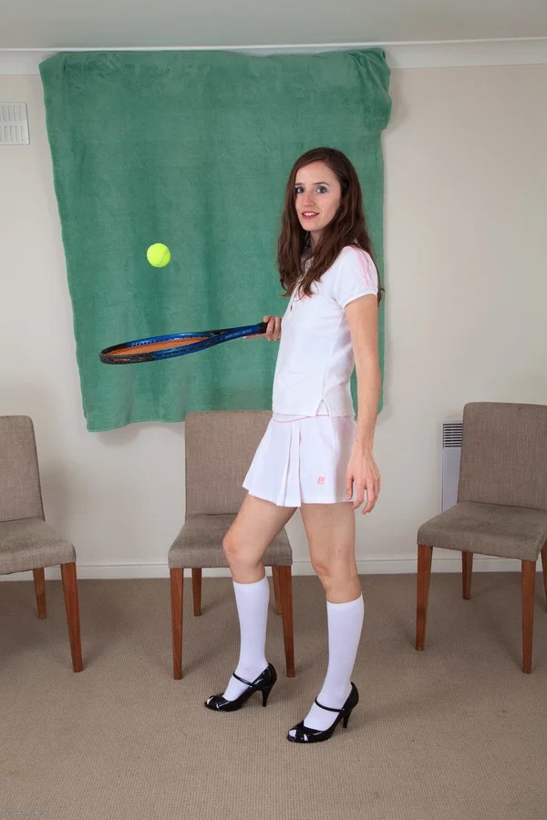 Brunette teen strips to white knee socks and heels while holding a racquet  - Socks, Panties, Hairy, College, Teen, Spreading, Pussy, Ass, Amateur, Cute  - Photo 1