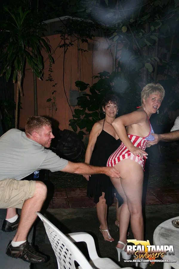 Playful amateur mature swinger wives teasing and French kissing at a party  - Swingers, Groupsex, Amateur, Reality, Clothed, Skirt, Big Tits, White, Short Hair, Upskirt  - Photo 6