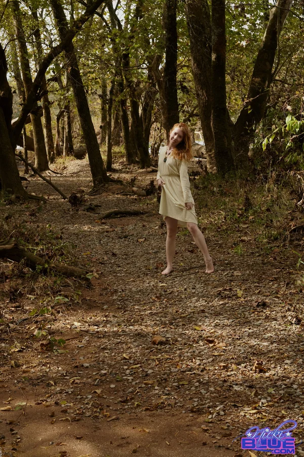 Natural redhead Nicki Blue shows some leg while wading into a shallow stream  - Non Nude, Outdoor, Wet, Upskirt, Redhead, Face, Skirt, Beautiful, Pornstar, Babe  - Photo 5