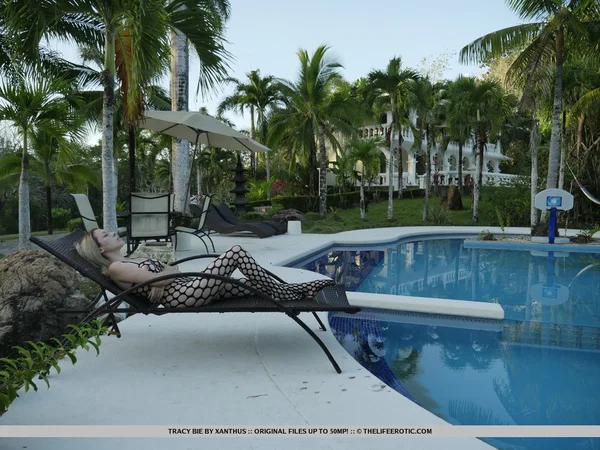 Young girl Tracy Bie plays with her hairless pussy on a poolside lounge chair  - Teen, Cute, Close Up, Nipples, Outdoor, Face, Pool, Model, Feet, PAWG  - Photo 2