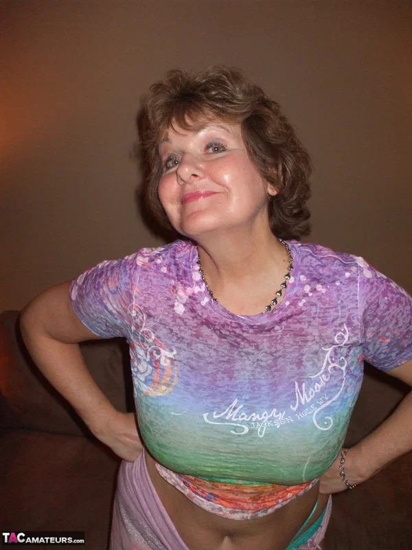 Older amateur Busty Bliss flashes the bird before uncovering her natural tits  - Mature, BBW, Amateur, Chubby, Saggy Tits, Curvy, Thick, Nipples, Big Tits, Panties  - Photo 5