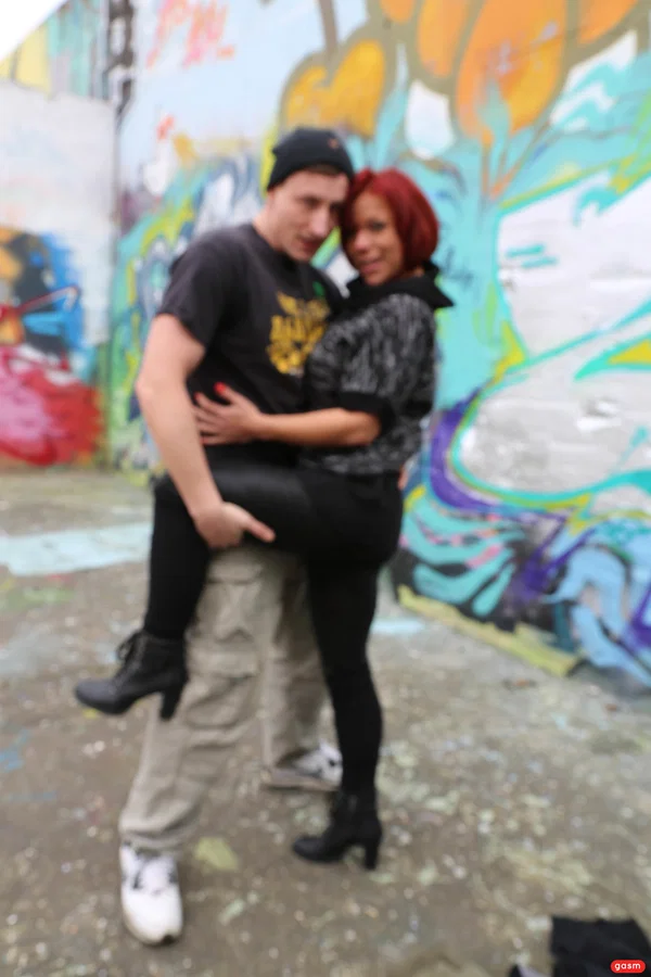 Kinky German MILF Jolyne Joy gets her big tits massaged by a photographer  - German, Mature, Short Hair, MILF, Redhead, Big Tits, Outdoor, High Heels, Clothed, Pornstar  - Photo 1