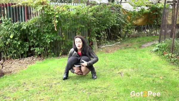 Long haired Corin bares her hairy pussy while taking a pee on the grass  - Public, Pissing, Jeans, Hairy, Pussy, European, Close Up, Babe, Brunette, Clothed  - Photo 11