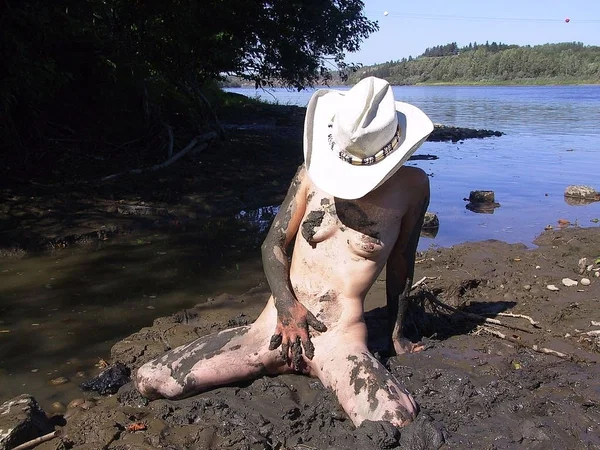Skinny babe in a cowboy hat flaunts her tiny tits & spreads naked in the mud  - Beach, Wet, MILF, Outdoor, Fetish, Tiny Tits, Ass, Glasses, Asshole, Amateur  - Photo 21