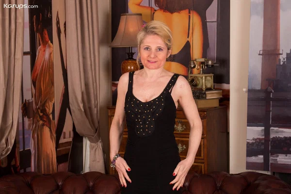 Older lady with blond hair Lily Roma takes off little black dress in stockings  - Mature, Amateur, Saggy Tits, Pussy, Stockings, Spreading, High Heels, Clothed, Short Hair, Shaved  - Photo 1