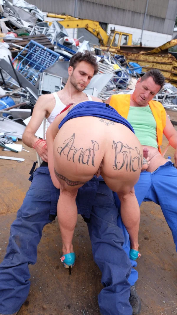 Redhead MILF with tattoos and fake tits gets banged in a junk yard 3some  - German, Blowbang, Gangbang, Tattoo, Ass, Groupsex, Upskirt, PAWG, Redhead, Cumshot  - Photo 11