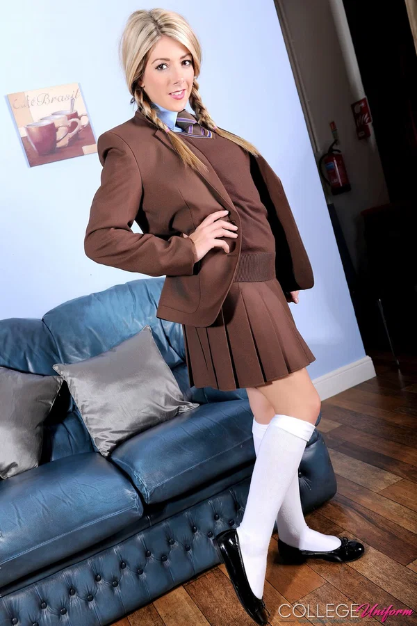 Blonde coed Tillie holds her pigtails while going topless in white knee socks  - Schoolgirl, College, Uniform  - Photo 1