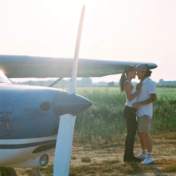 European girlfriend Carolina Abril making out with her man in his helicopter  - Reality, Erotic, Glasses, Non Nude, Pornstar, Outdoor, Brunette, Clothed  - Photo 3