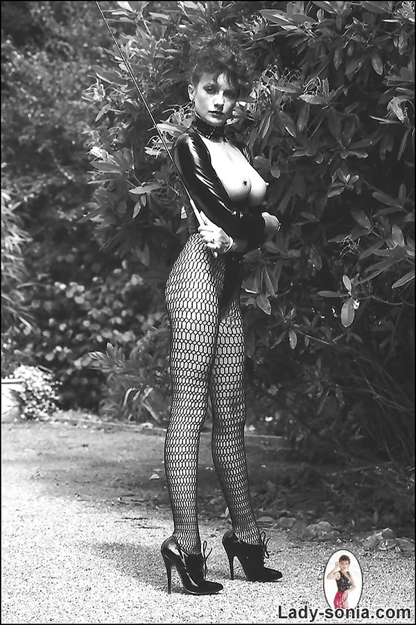 Leggy lady in fetish outfit exposing her boobs in vintage photo set  - Lingerie, Pantyhose, Mature, Fetish, Outdoor, Big Tits, Fake Tits, Vintage  - Photo 7