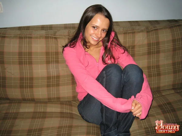 Brunette amateur unveils her skinny body while getting naked on a sofa  - Stripper, Jeans, Socks, Lingerie, Undressing, Spreading, Cute, Clothed, Pussy, Natural Tits  - Photo 2
