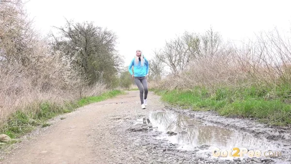 Blonde girl Mistica pees in a puddle on a dirt road through the countryside  - Pissing, Public, Jeans, Pussy, Hairy, Outdoor, Spreading, Close Up, Ass, PAWG  - Photo 1