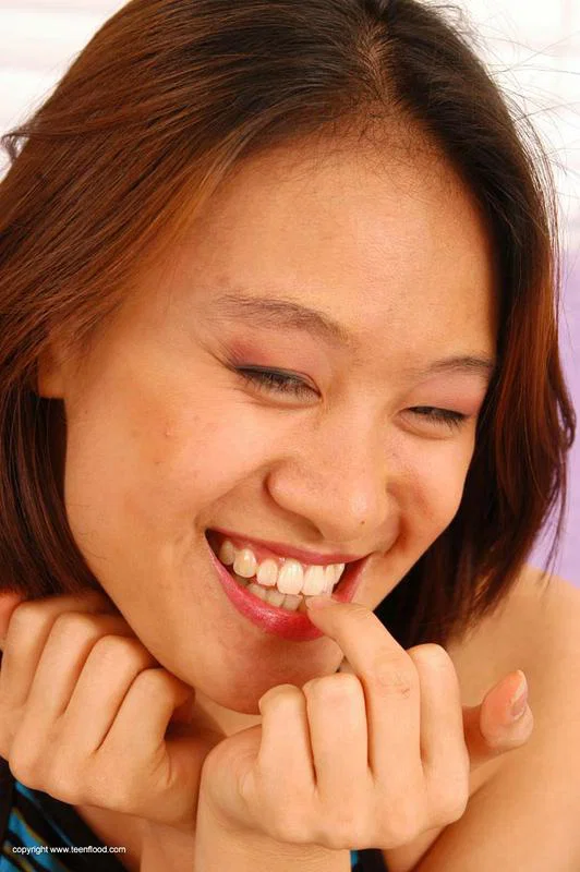 Asian teen May strips totally naked prior to a finger fuck  - Asian, Amateur, Beautiful, Big Tits, Redhead, Ass, Face, Hairy, Spreading, Panties  - Photo 1