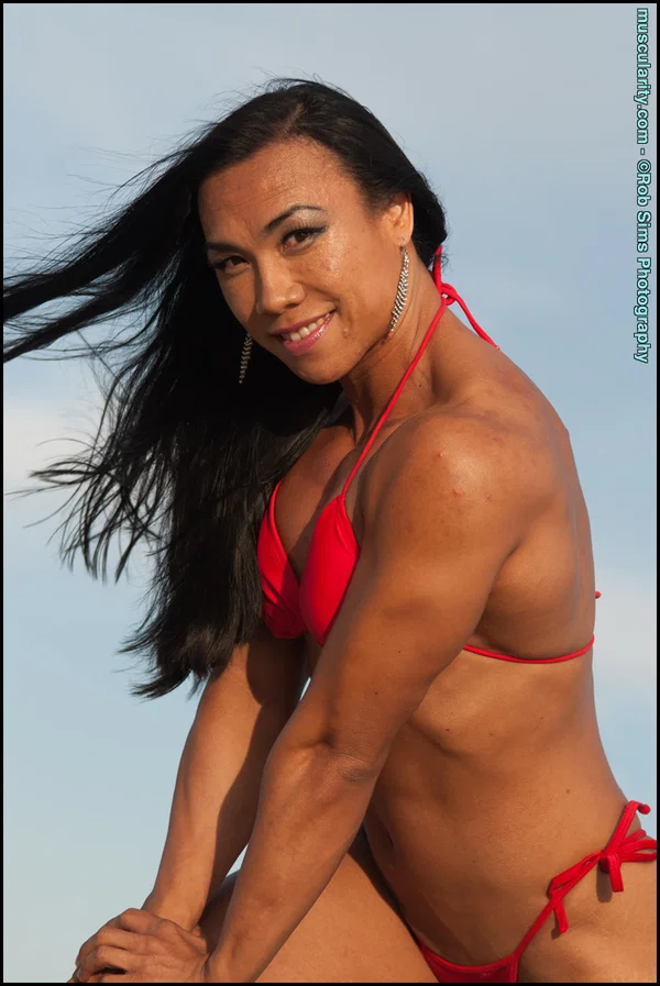 Asian bodybuilder Tram Nguyen flexes at the beach in a red bikini  - Sports, Beach, Asian, Bikini, MILF, Tiny Tits, Outdoor, Ass, Legs, Tattoo  - Photo 12