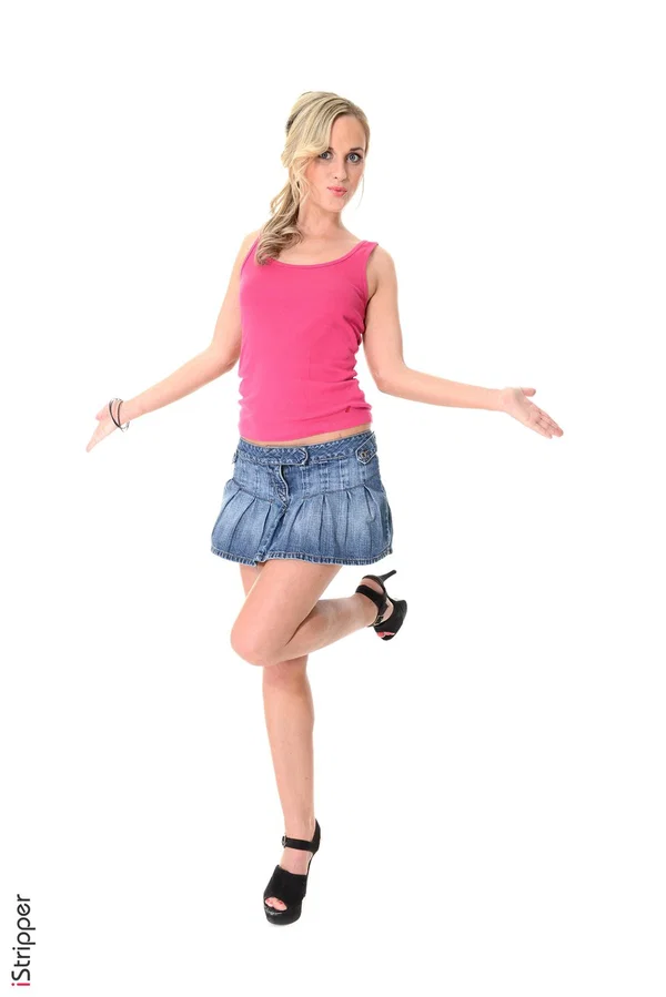 Dirty blonde Vinna Reed sucks on a finger before stripping to black heels  - Babe, Blonde, Skirt, Ass, Face, Masturbation, Panties, European, High Heels, Beautiful  - Photo 1