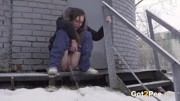 White girl pulls down her jeans to pee in the snow behind a building  - Pissing, Jeans, Outdoor, Pussy, Spreading, Solo, Close Up, Shaved, Panties, Babe  - Photo 11