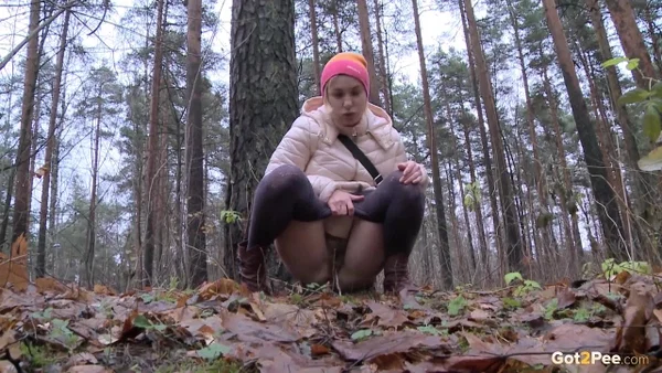 Blonde girl Anya pulls down her pants for an urgent piss while in a forest  - Pissing, Hairy, Pussy, Close Up, Spreading, Pantyhose, Outdoor, Boots, Solo, Babe  - Photo 3